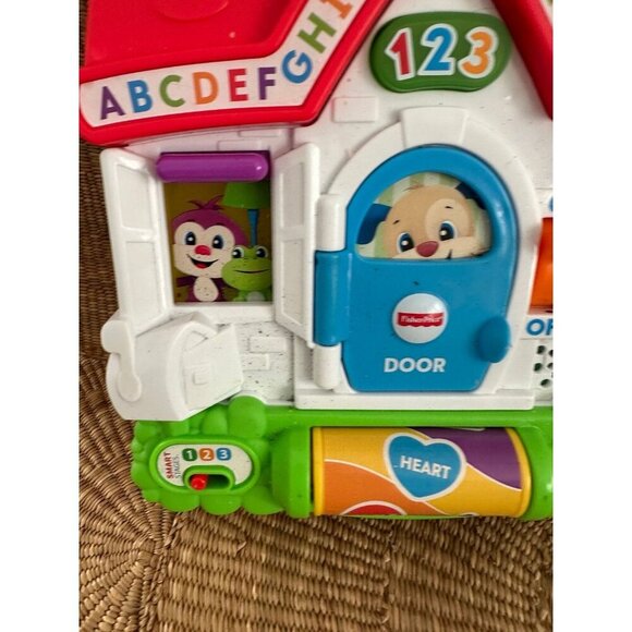 Fisher-Price Laugh & Learn Puppy's Busy Activity Home - Picture 3 of 11